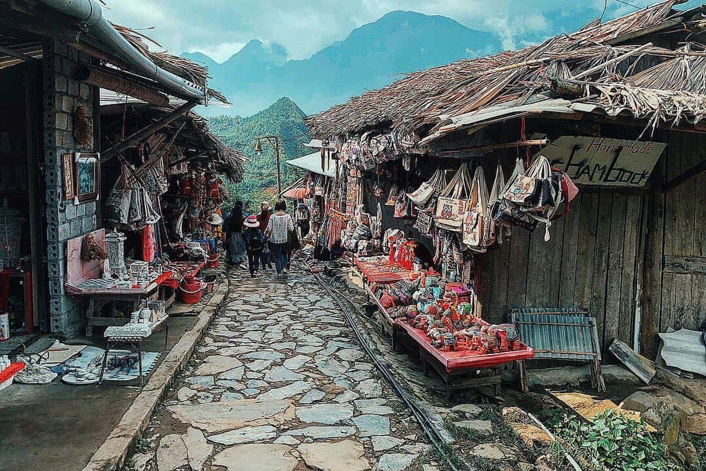 Hmong textiles along a village lane in Sapa
