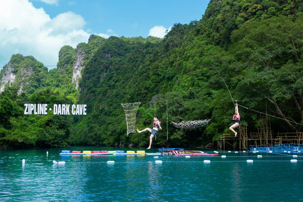 Zipline over the river at the Dark Cave, Phong Nha