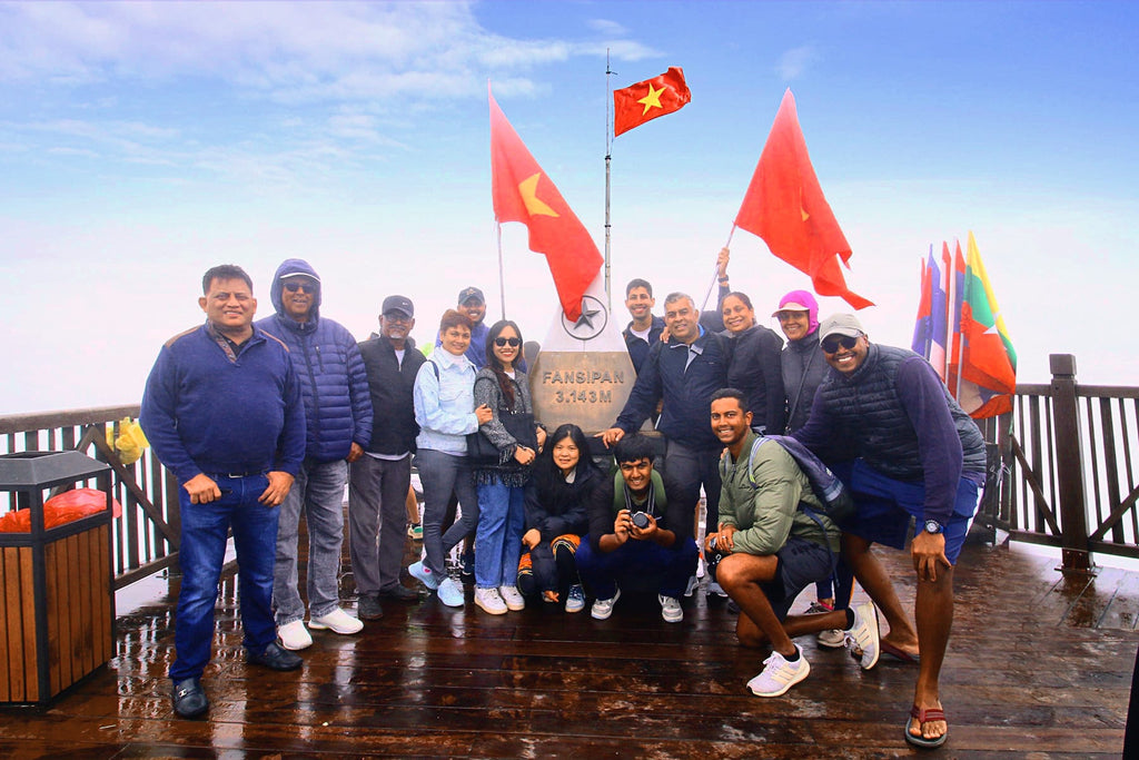 Connek Trip guests at the top of Fansipan