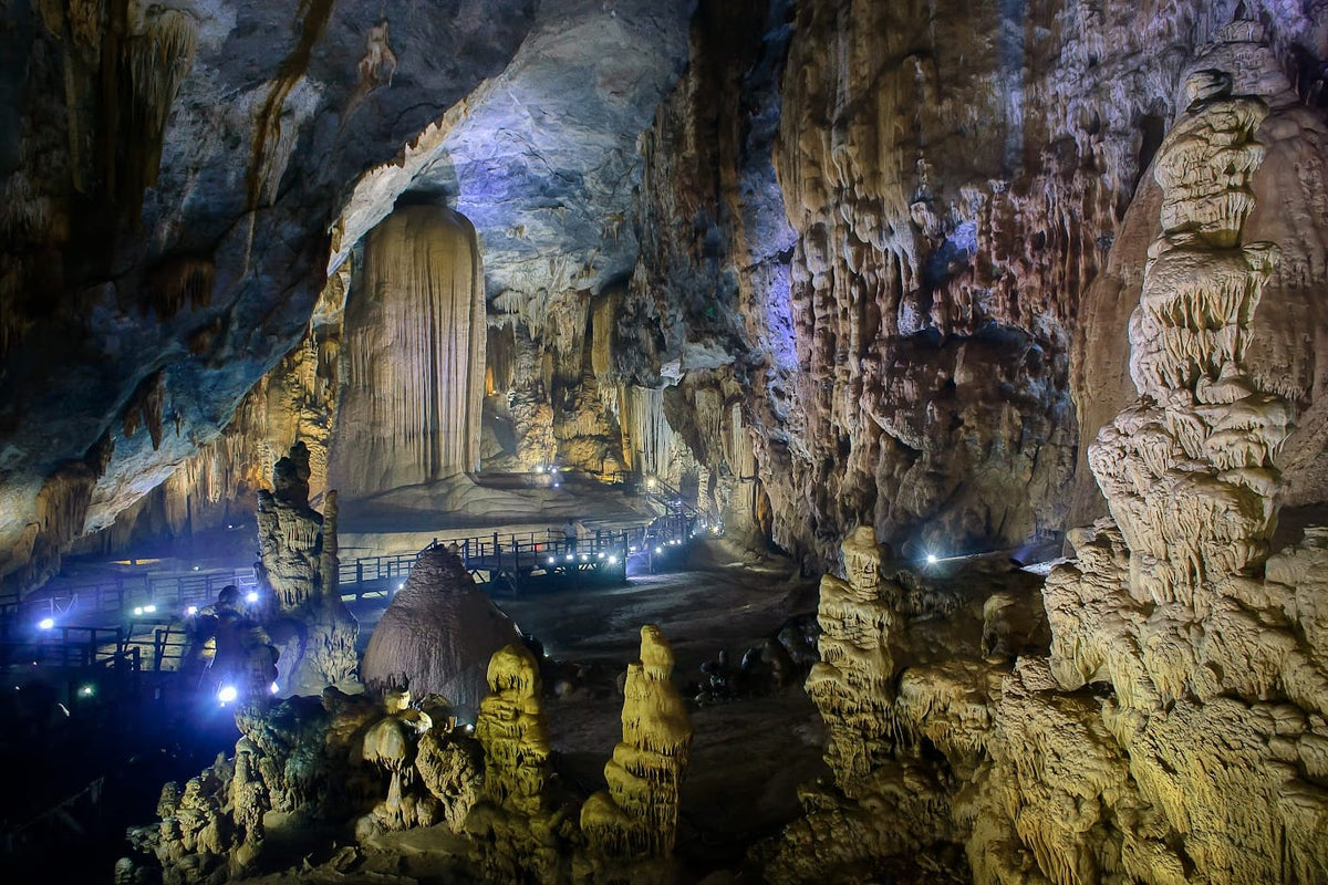 Lit rock formations inside a cave in Phong Nha