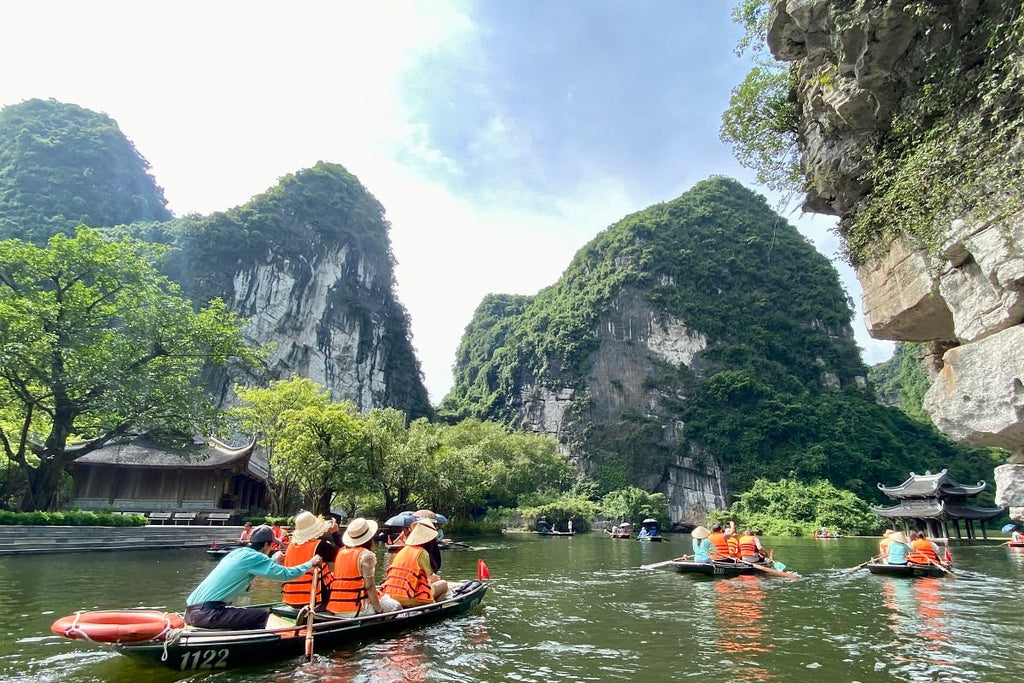 Rowing boats on the river at Trang An, Ninh Binh
